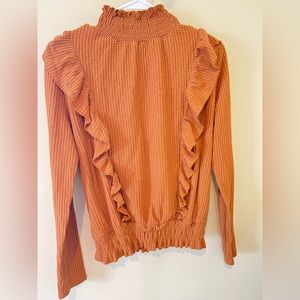 Burnt orange sweater